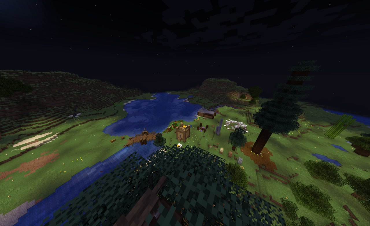 Screenshot of the riverside of the player village taken from the top of a tall tree, before any of the structures present in the above screenshot were built.